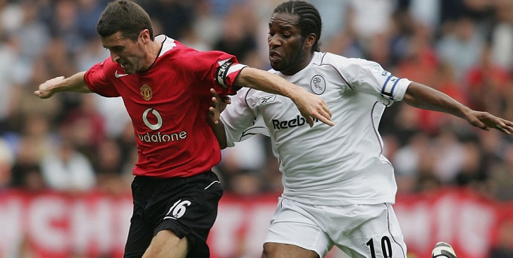 Jay-Jay Okocha takes on Keane