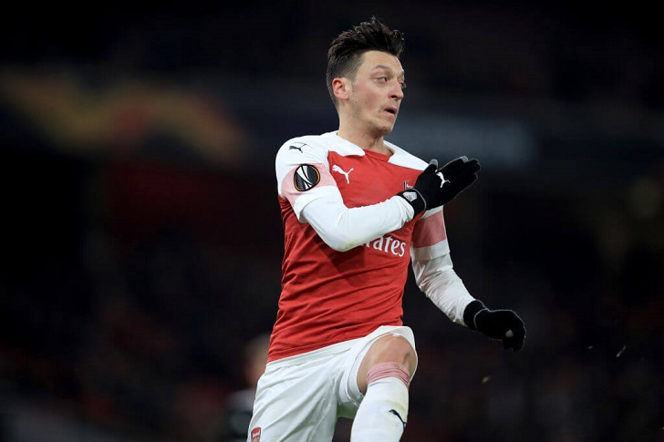 Mesut Ozil in action for Arsenal.