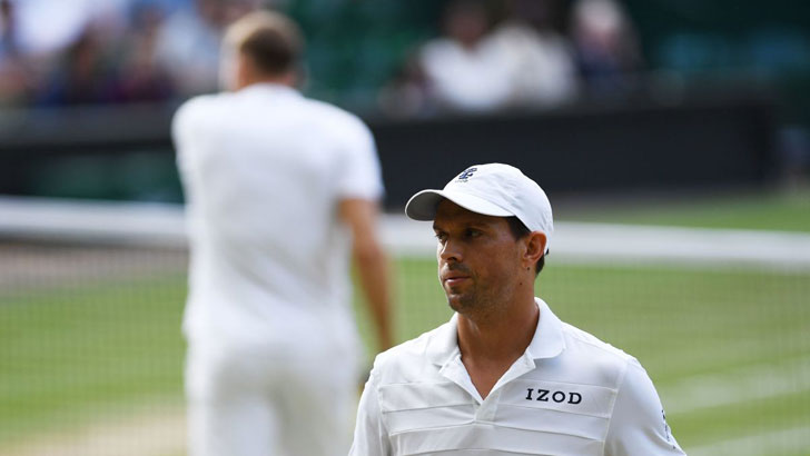 Mike Bryan in action. Mike Bryan in action.