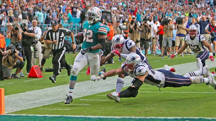 Miami Dolphins running in a touchdown